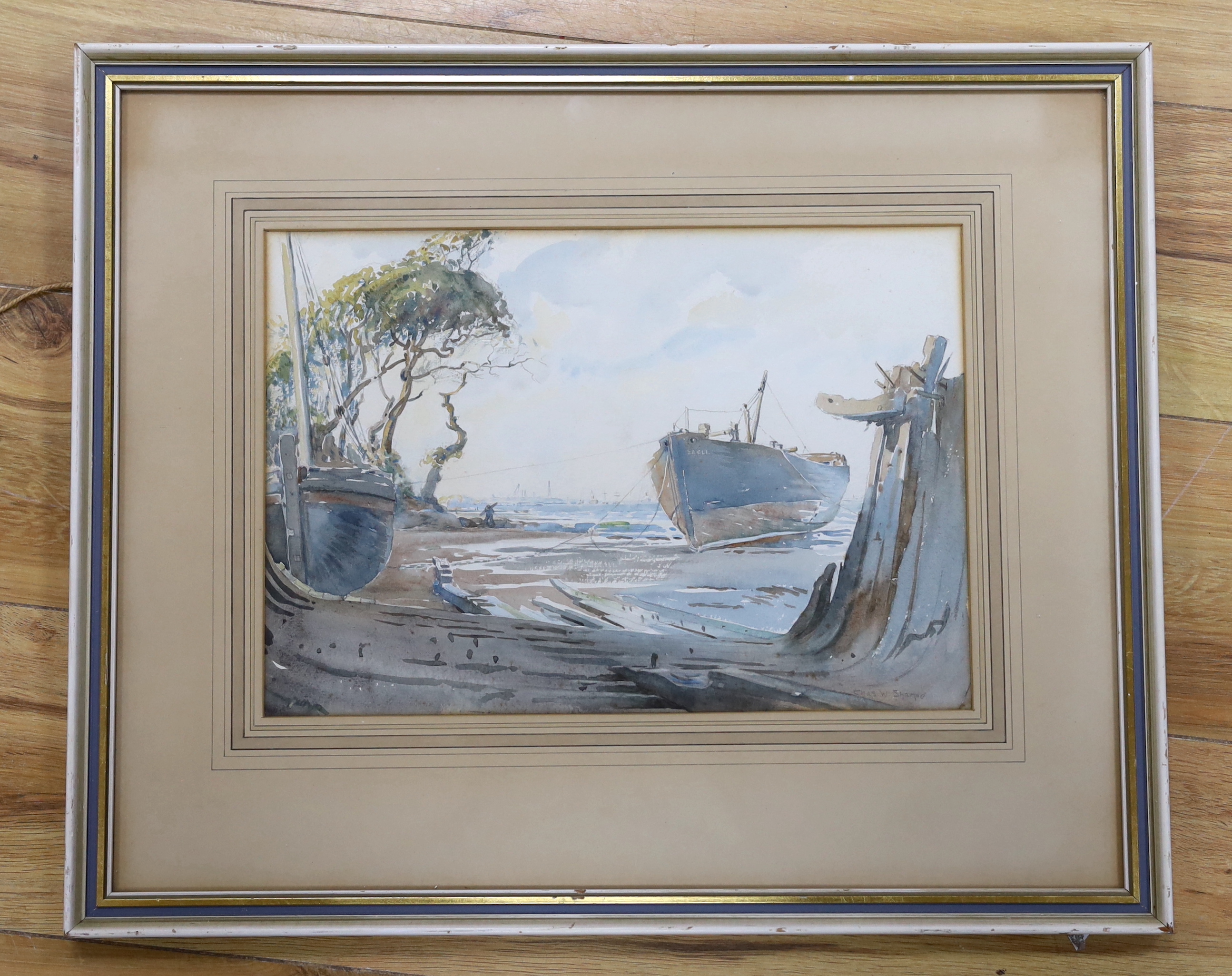 Charles William Sharpe (1881-1955), watercolour, Coastal scene with moored boats, signed, 35 x 24cm